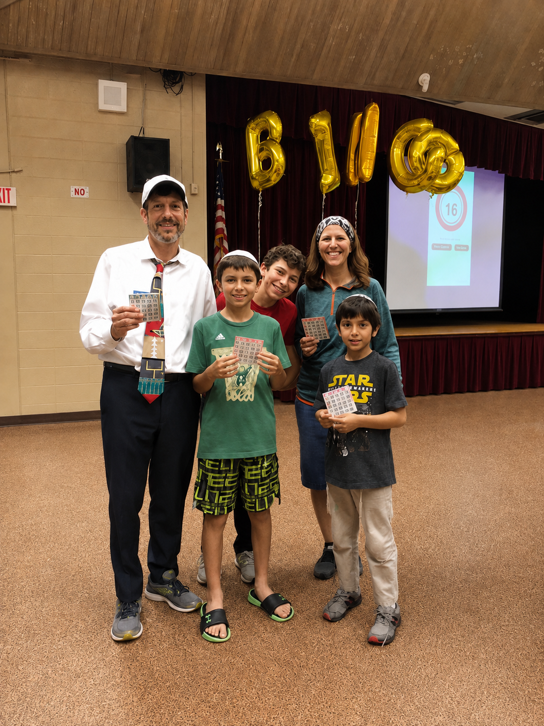 Dr. Martin Karp with his wife Danielle and sons Benjamin, Herschel, and Samson
